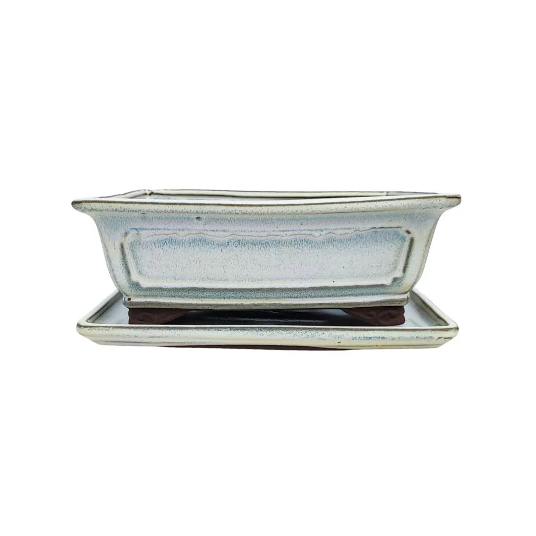Vaso rettangolare per piante ornamentali in ceramica crema con base rialzata e fori di drenaggio